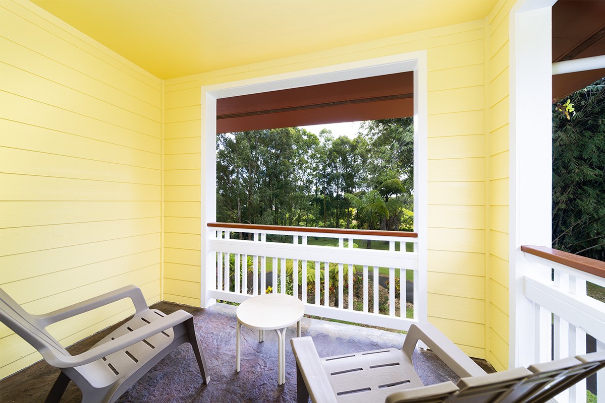 28-380 Sugar Mill Road Pepeekeo, HI 96783 - Photo 23 of 29 a view of a chair in wooden deck