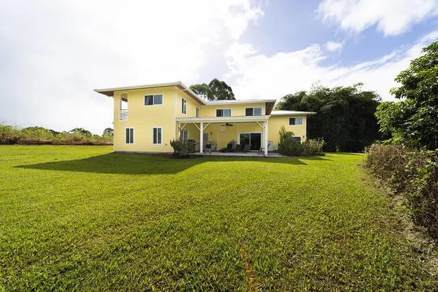 a view of swimming pool with a patio