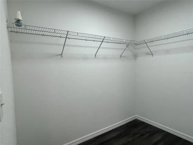 a view of a room with racks on the wall