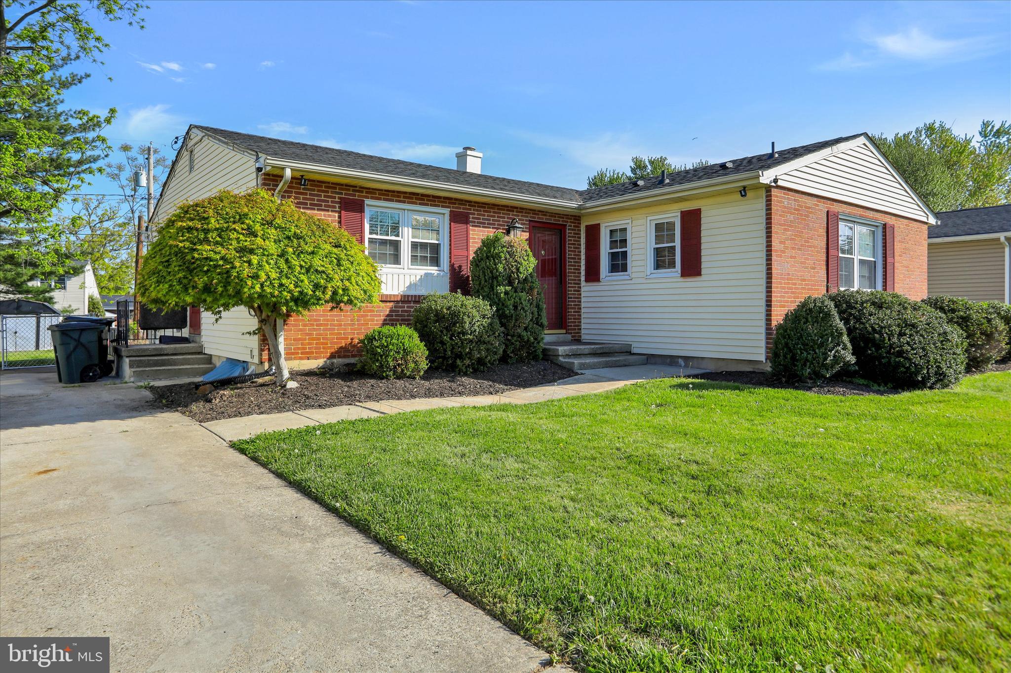 8314 Tinsley Road Baltimore, MD 21244 - Photo 1 of 44 a view of a house with backyard and garden