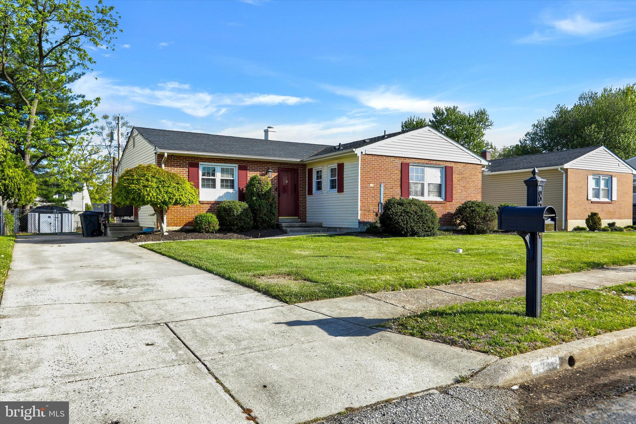 8314 Tinsley Road Baltimore, MD 21244 - Photo 2 of 44 a front view of a house with garden