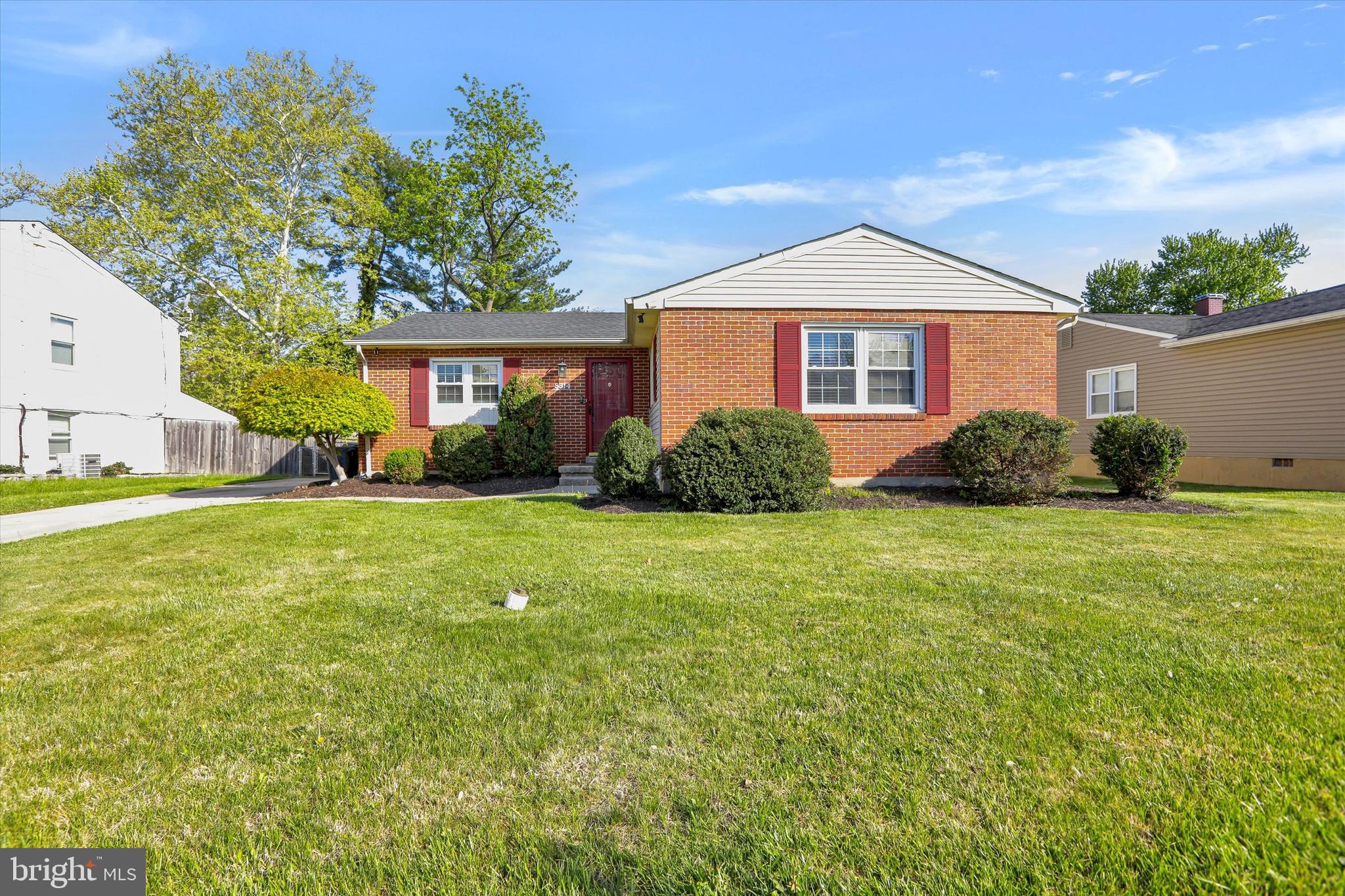 8314 Tinsley Road Baltimore, MD 21244 - Photo 4 of 44 a front view of a house with garden