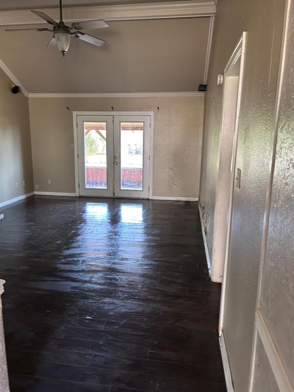 10127 Freedoms Way Keithville, LA 71047 - Photo 3 of 14 a view of an empty room with wooden floor and a window