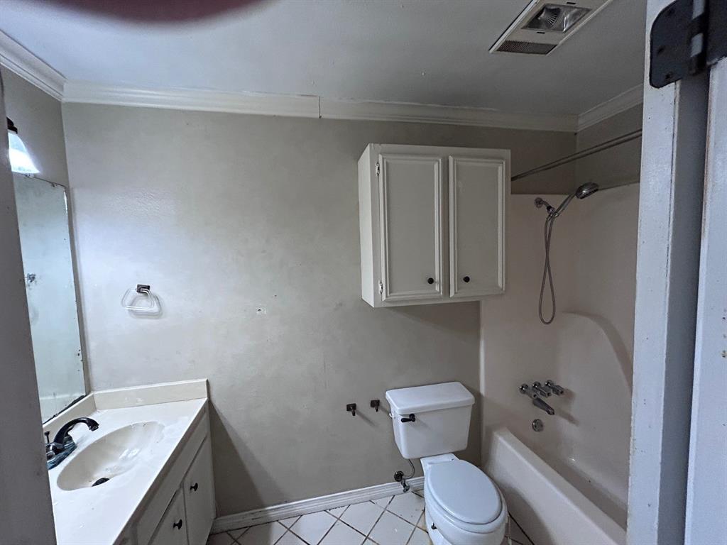 10127 Freedoms Way Keithville, LA 71047 - Photo 10 of 14 a bathroom with a granite countertop sink toilet and shower