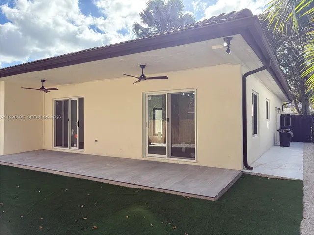 a view of a backyard with a garden