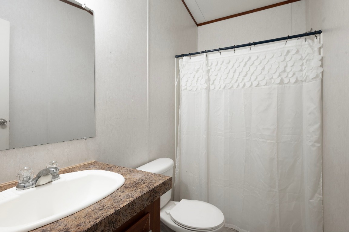 6493 Pappas Road Waller, TX 77484 - Photo 13 of 28 Full bathroom with vanity storage and tub/shower combination.
Designed for everyday use with a straightforward layout and easy maintenance.
