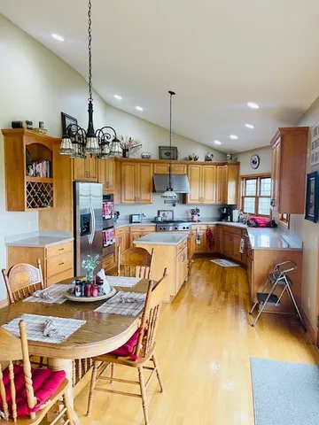 a view of a dining room with furniture