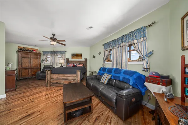 a view of balcony with wooden floor