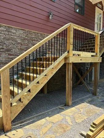 a view of balcony with deck and wooden floor