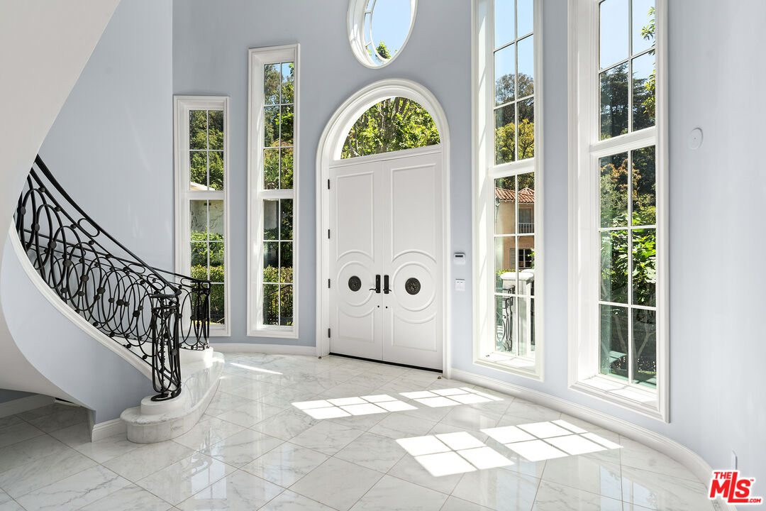 1357 Schuyler Road Beverly Hills, CA 90210 - Photo 2 of 9 a view of entryway with interior