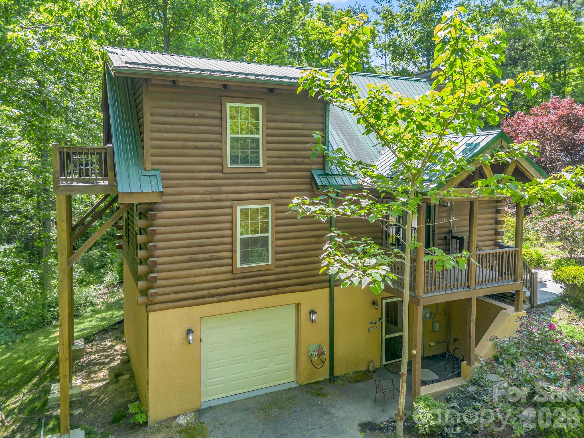 165 Dream Road Hendersonville, NC 28792 - Photo 44 of 46 a view of a house with a backyard