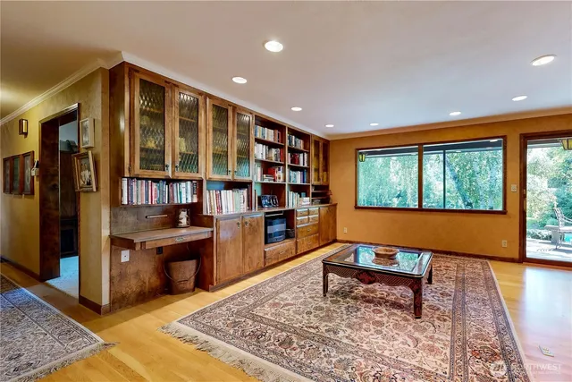 a view of living room with furniture and a window