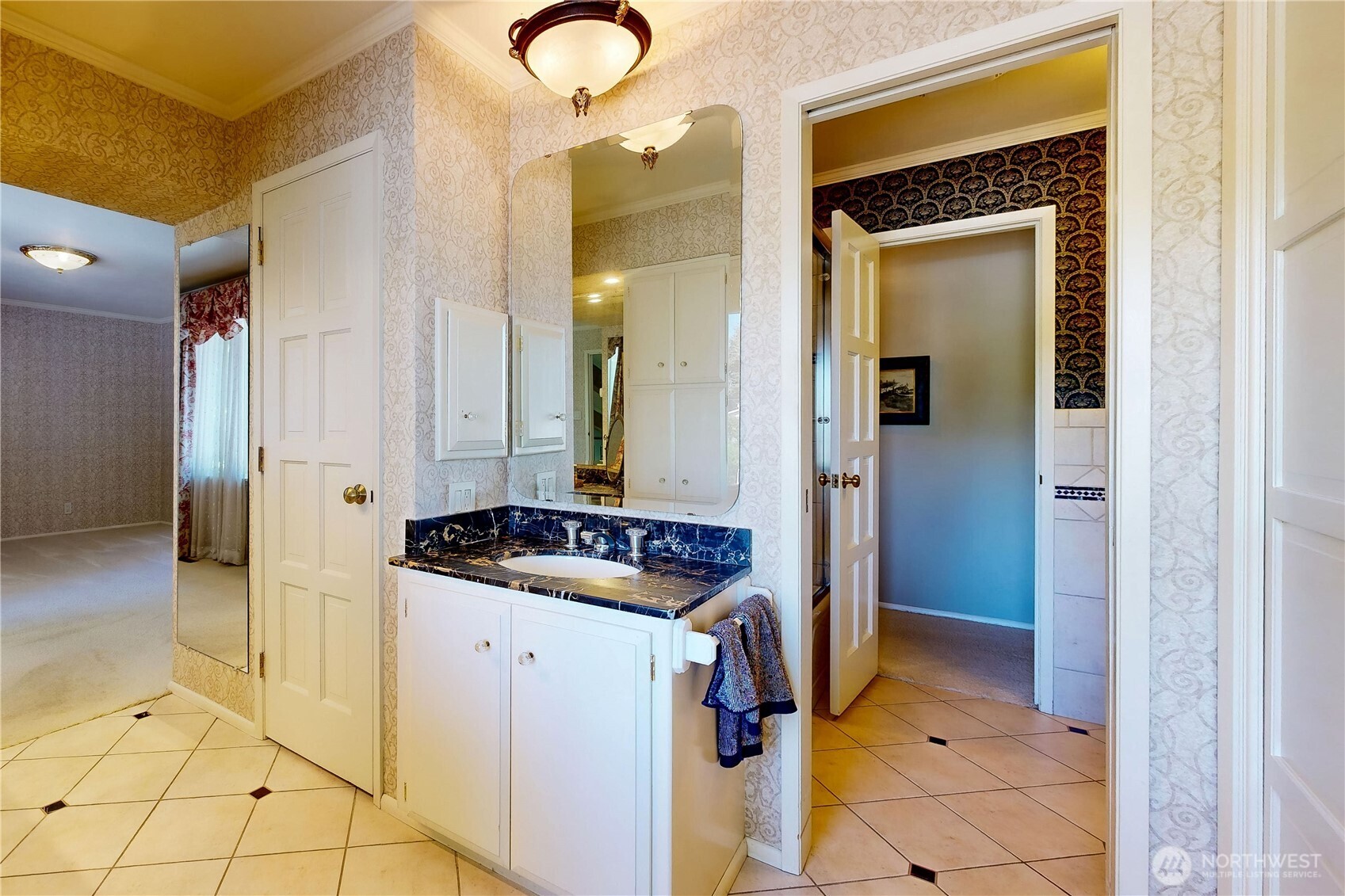 240 Stone Street Walla Walla, WA 99362 - Photo 20 of 40 a bathroom with a granite countertop sink and a mirror