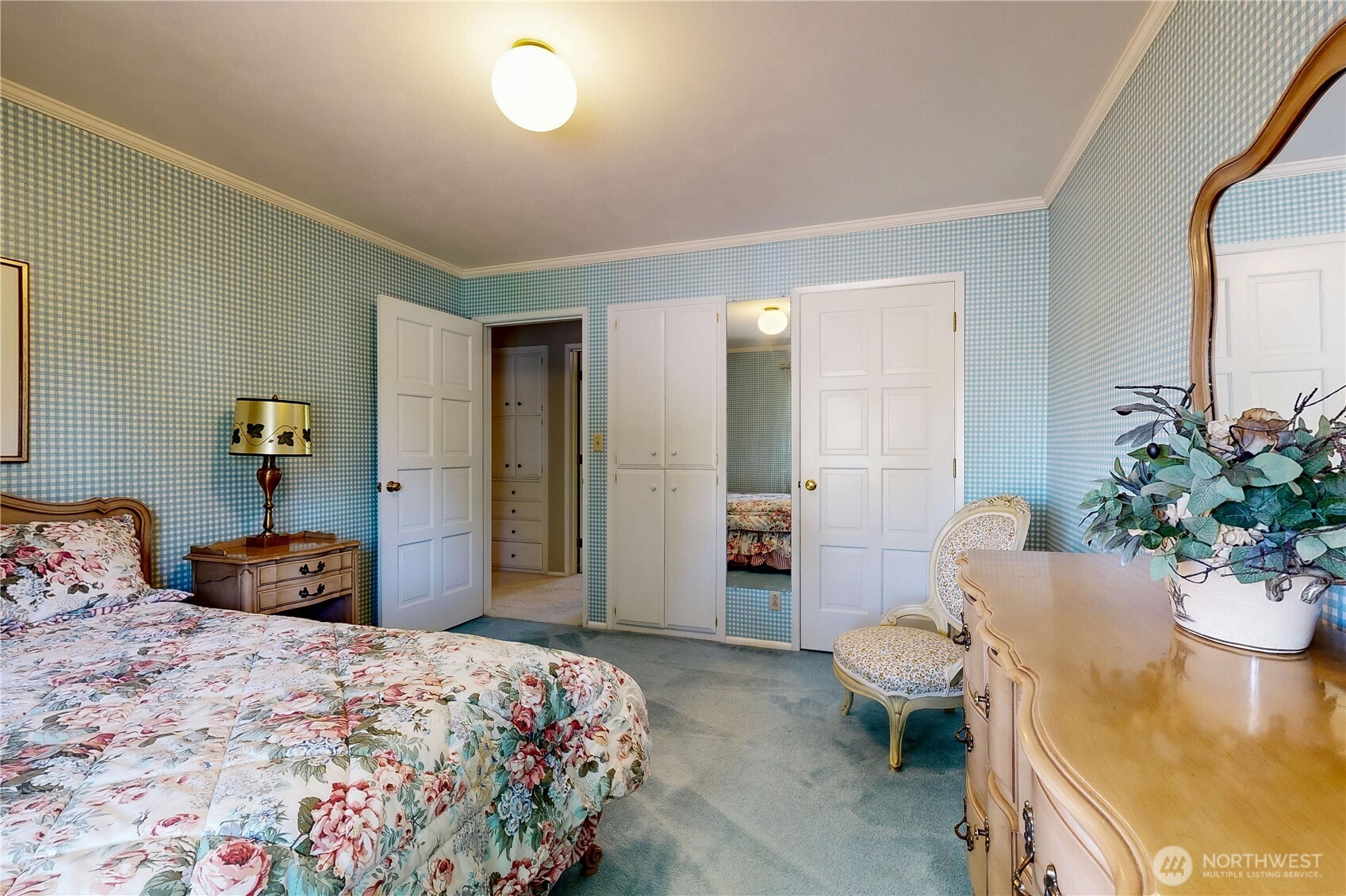 240 Stone Street Walla Walla, WA 99362 - Photo 25 of 40 a bedroom with bed and a potted plant