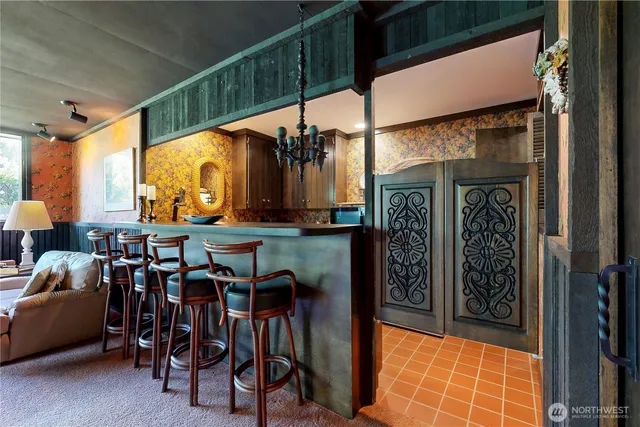 a kitchen with a sink and a stove