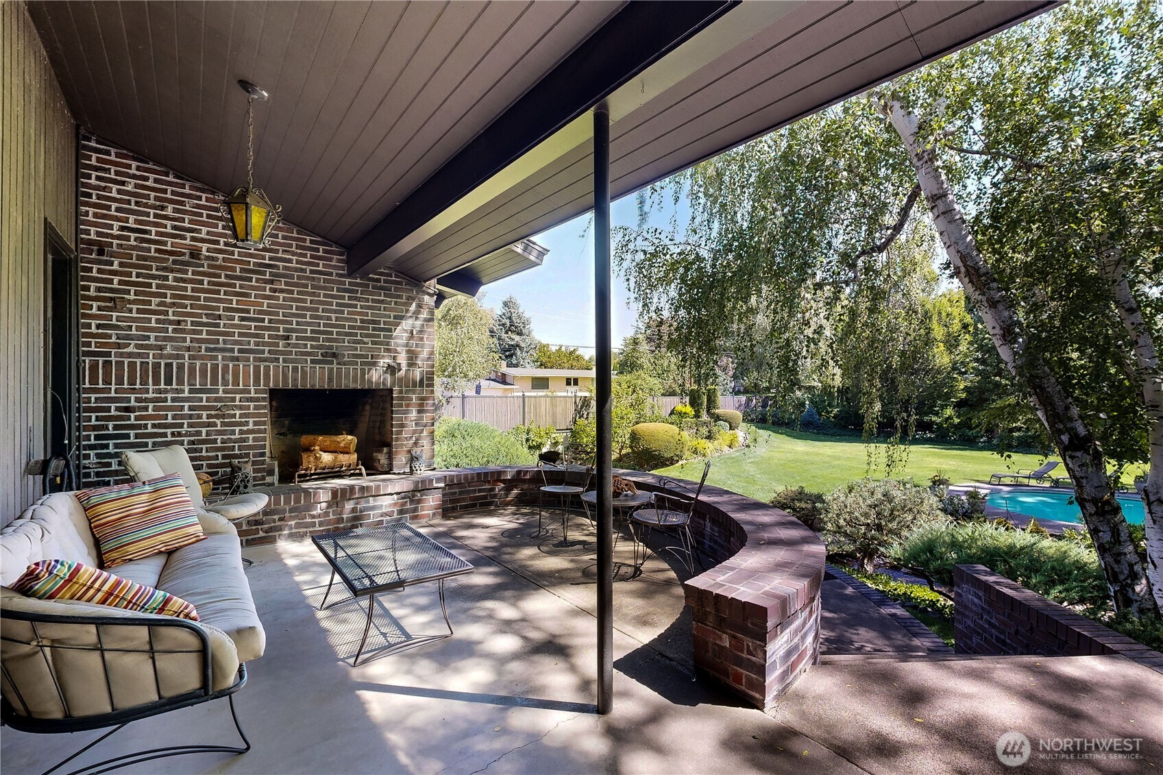 240 Stone Street Walla Walla, WA 99362 - Photo 34 of 40 a view of a patio with couches chairs and a fire pit