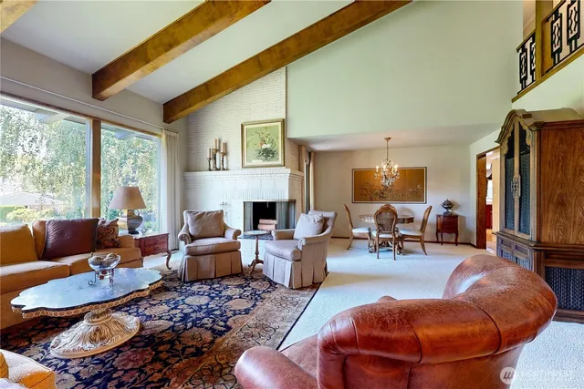 a living room with furniture or couch and a painting on the wall