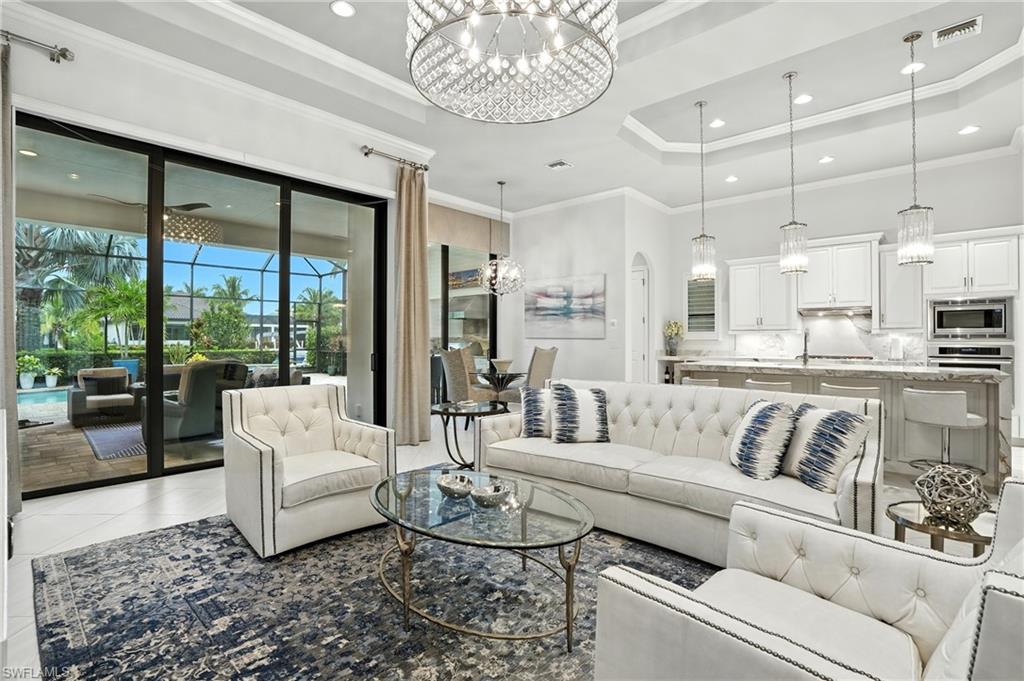 17483 Via Navona Way Miromar Lakes, FL 33913 - Photo 16 of 50 a living room with furniture and a large window