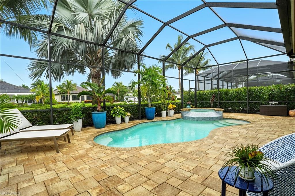 17483 Via Navona Way Miromar Lakes, FL 33913 - Photo 37 of 50 a view of a swimming pool with a patio