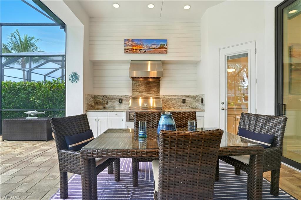 17483 Via Navona Way Miromar Lakes, FL 33913 - Photo 46 of 50 a view of a dining room with furniture window and outside view