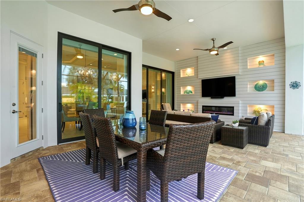 17483 Via Navona Way Miromar Lakes, FL 33913 - Photo 47 of 50 a view of a livingroom with furniture window and wooden floor