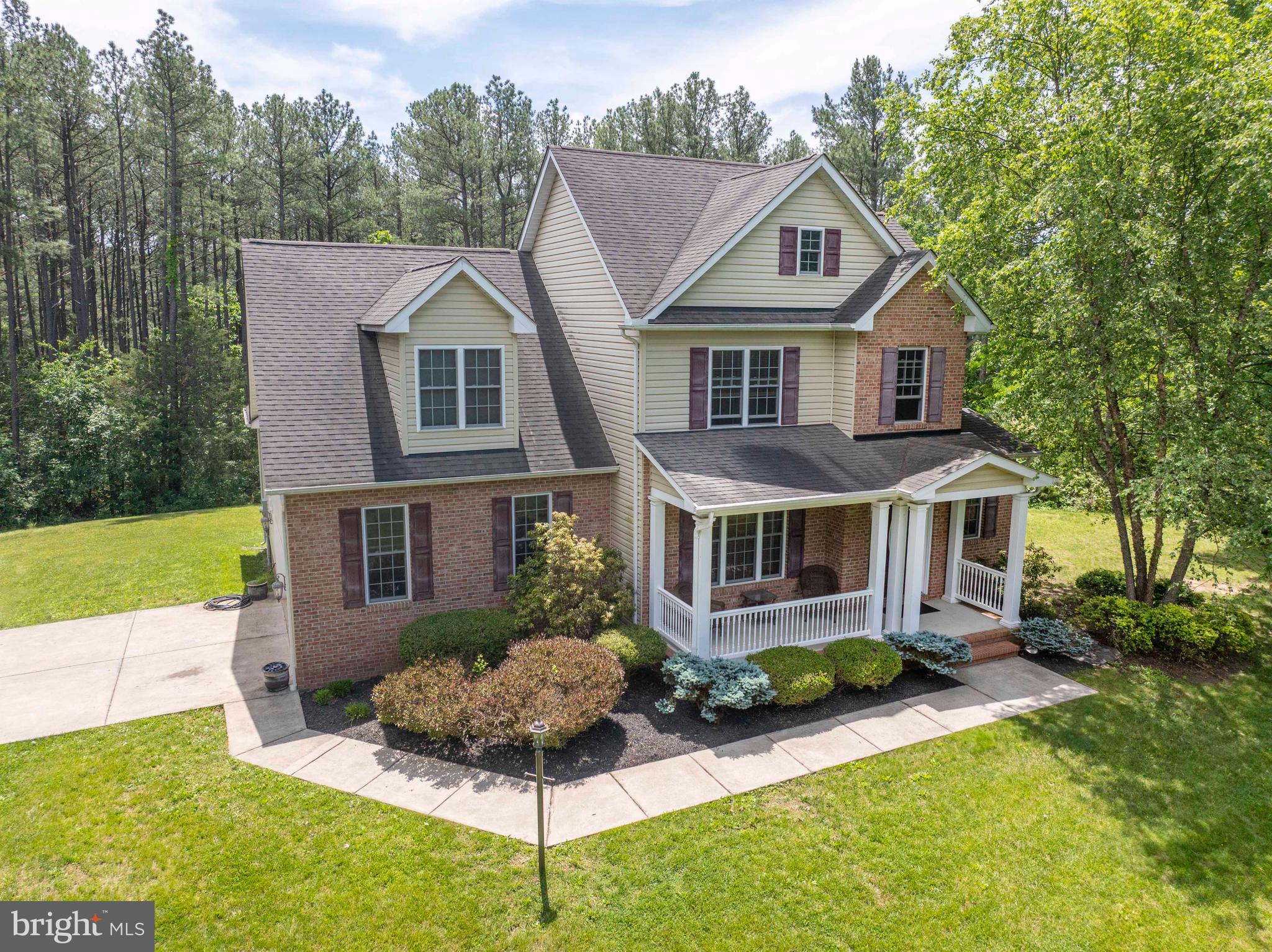 168 Thomas Drive Middletown, VA 22645 - Photo 2 of 66 a front view of a house with a yard and potted plants
