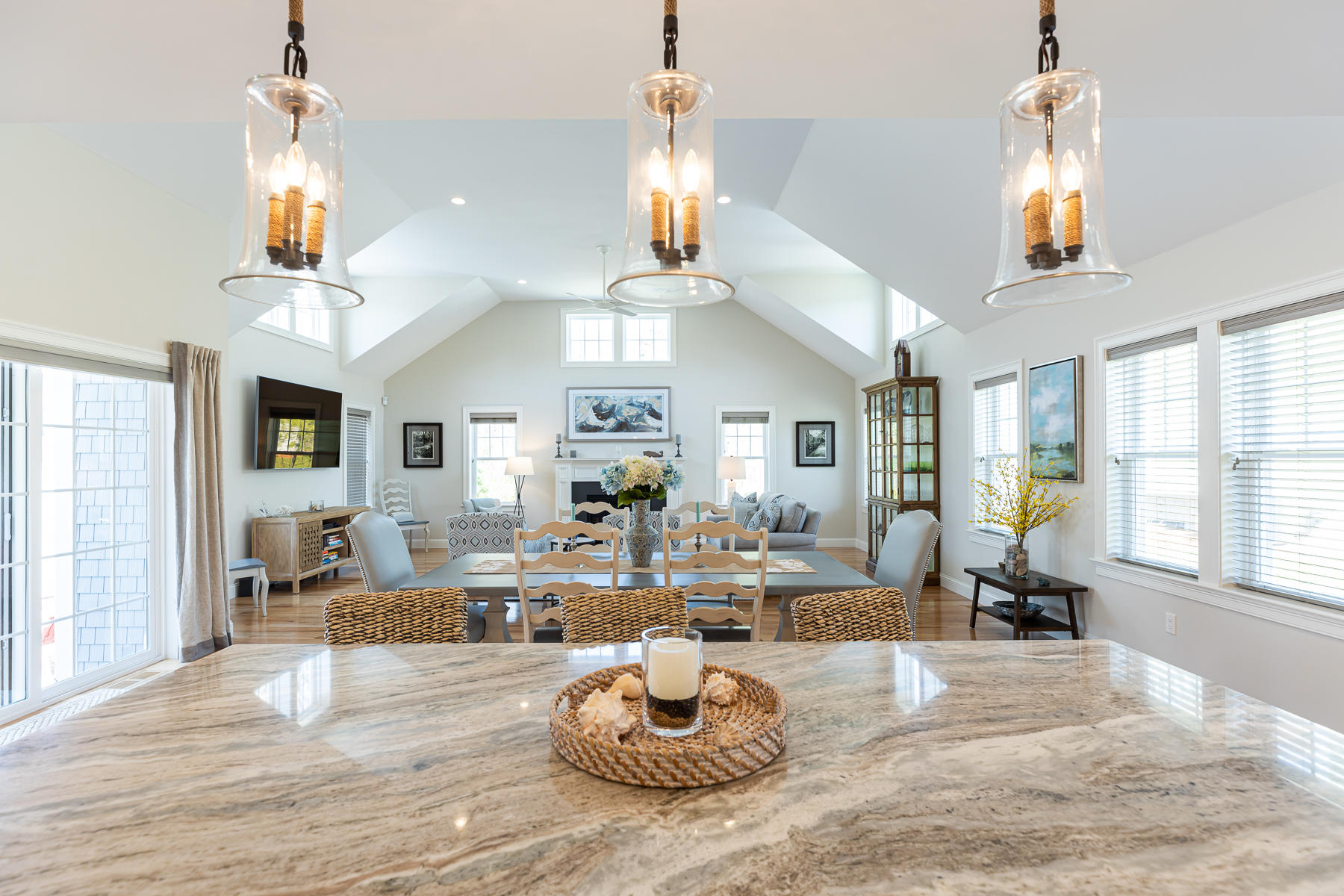 62 Cottage Lane Mashpee, MA 02649 - Photo 12 of 64 a living room with furniture and a chandelier