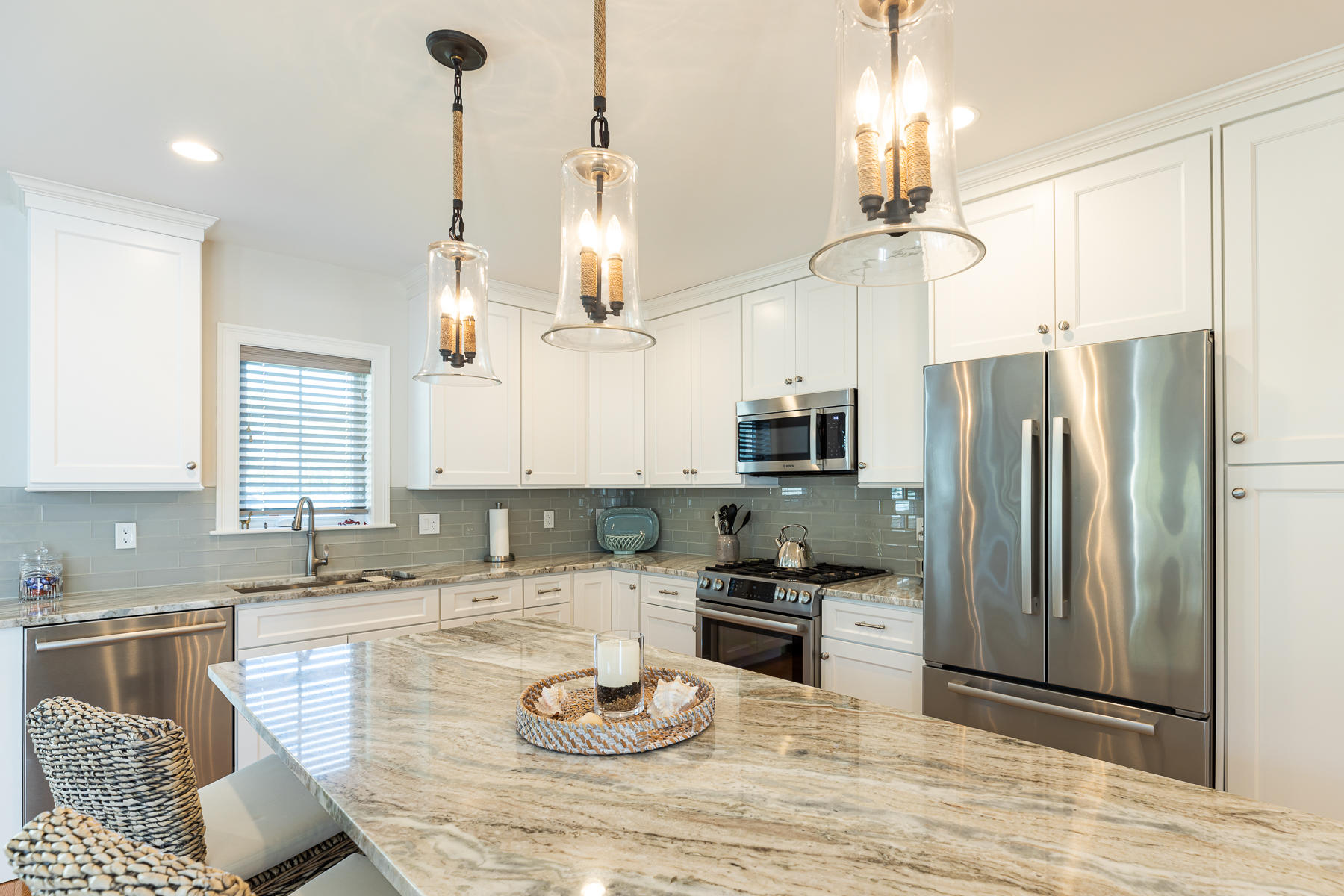 62 Cottage Lane Mashpee, MA 02649 - Photo 13 of 64 a kitchen with stainless steel appliances granite countertop a sink a stove and refrigerator