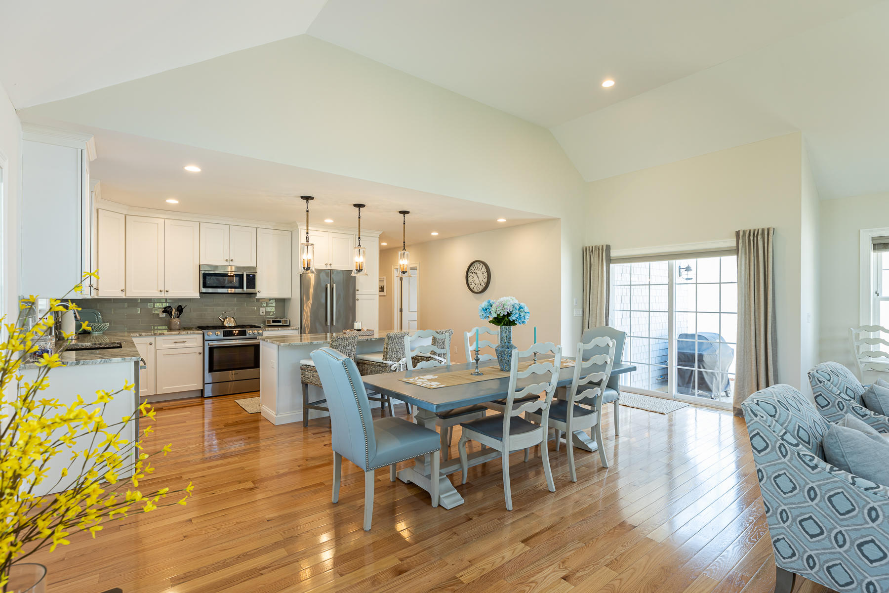 62 Cottage Lane Mashpee, MA 02649 - Photo 15 of 64 a view of a dining room with furniture and wooden floor