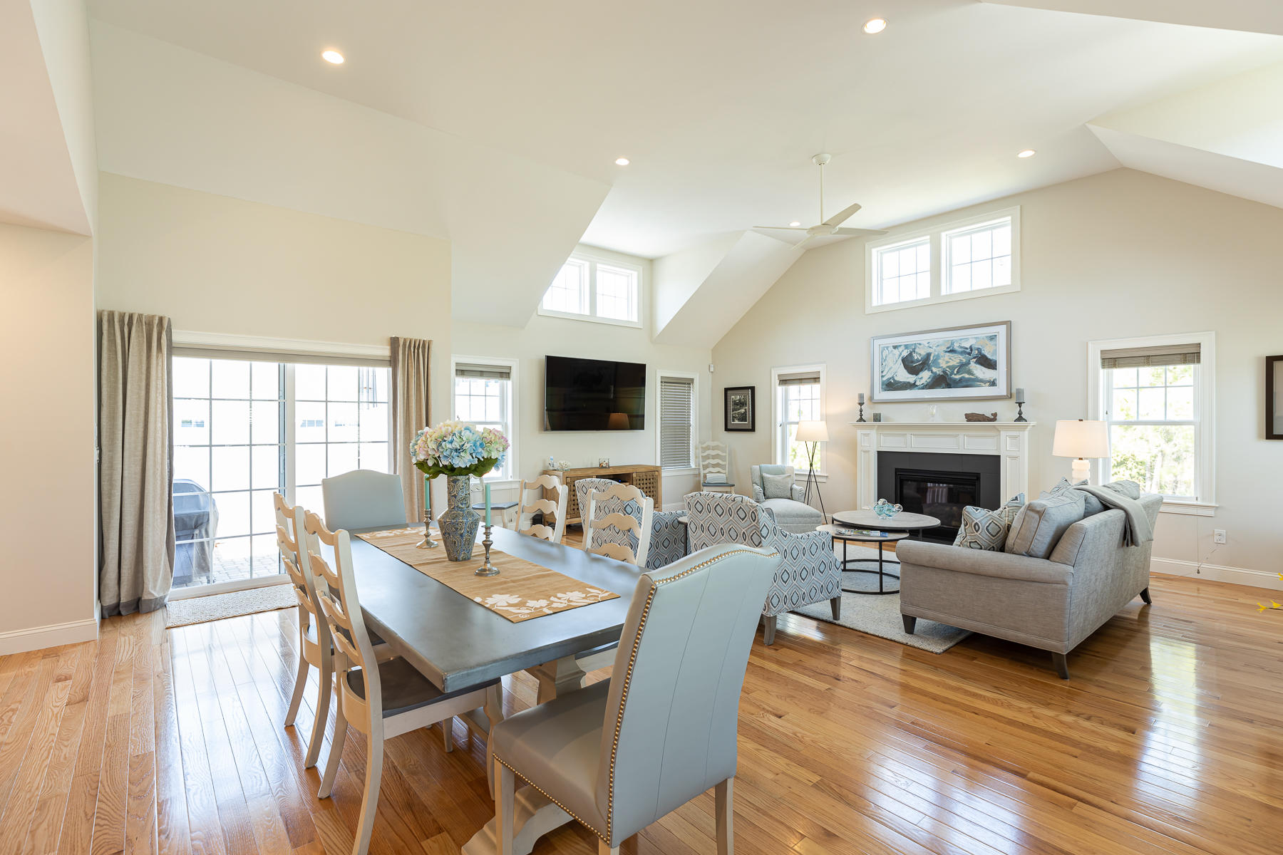 62 Cottage Lane Mashpee, MA 02649 - Photo 16 of 64 a view of a dining room with furniture window and wooden floor