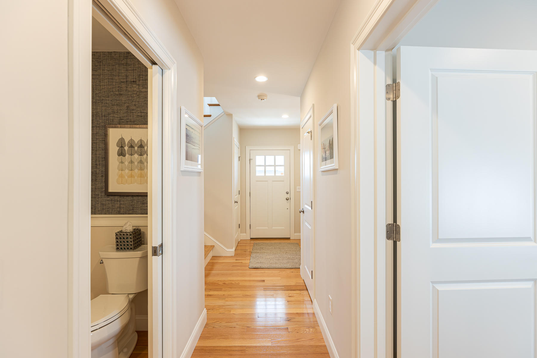 62 Cottage Lane Mashpee, MA 02649 - Photo 33 of 64 a view of a hallway with wooden shelves