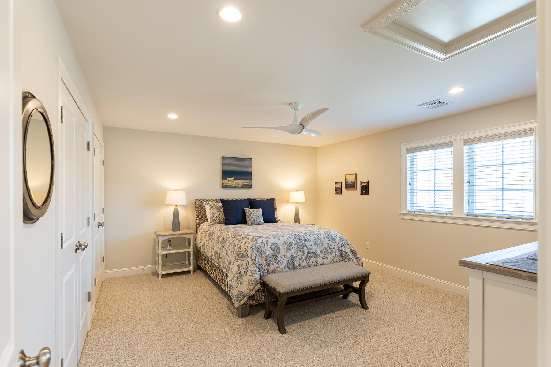 62 Cottage Lane Mashpee, MA 02649 - Photo 44 of 64 a bedroom with a bed a mirror and a window