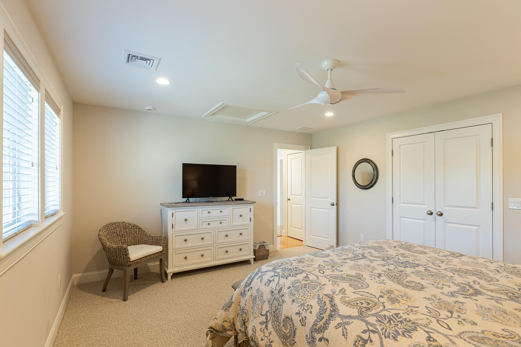 62 Cottage Lane Mashpee, MA 02649 - Photo 46 of 64 a bedroom with a bed and a flat screen tv