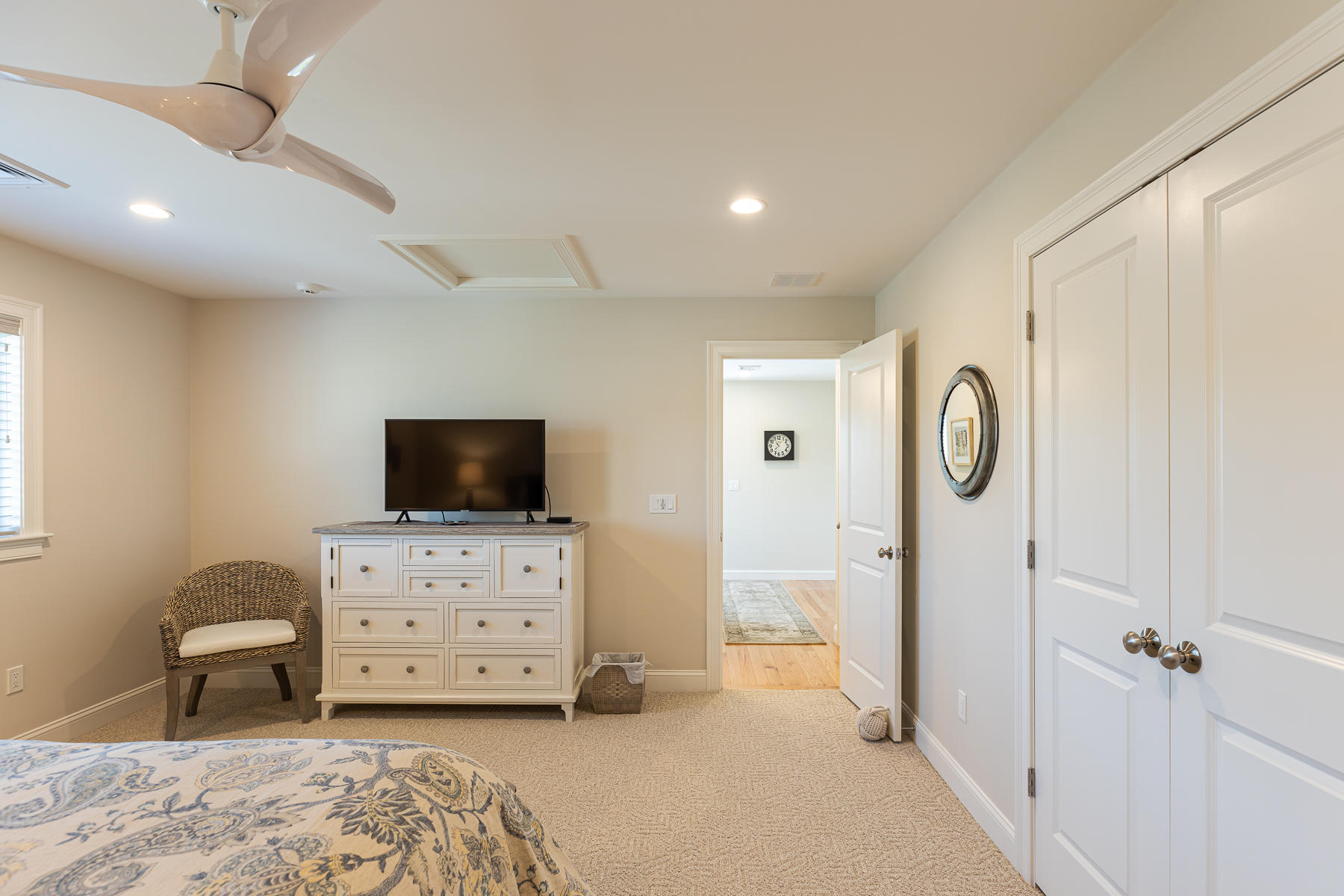 62 Cottage Lane Mashpee, MA 02649 - Photo 47 of 64 a bedroom with furniture and a flat screen tv