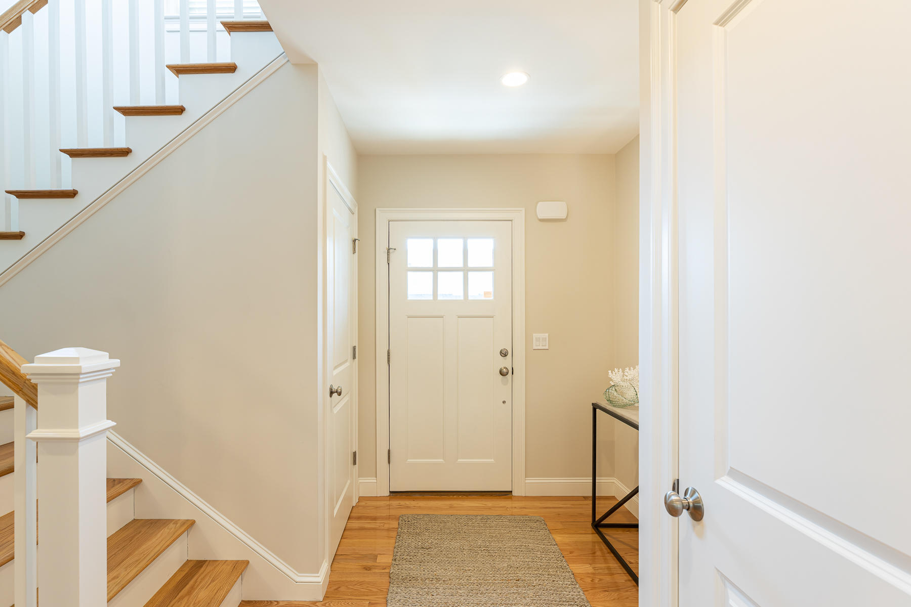 62 Cottage Lane Mashpee, MA 02649 - Photo 5 of 64 a view of a hallway with a white walls and entryway