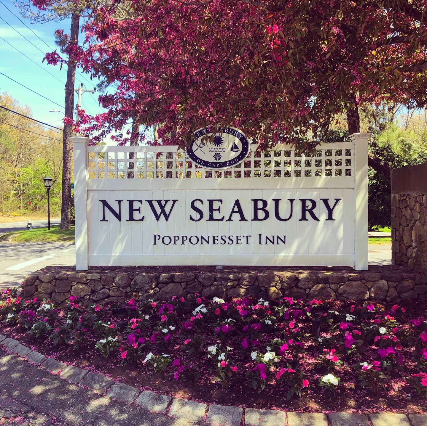 62 Cottage Lane Mashpee, MA 02649 - Photo 56 of 64 a sign on the side of a building