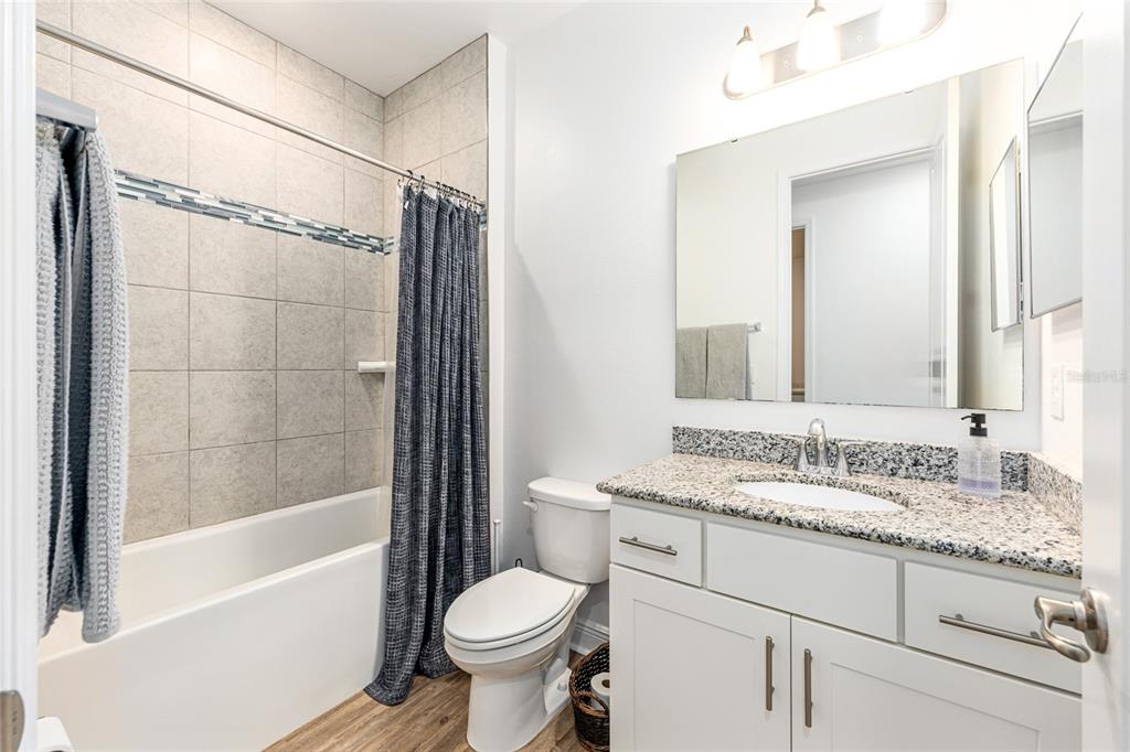 69 Grass Street Homosassa, FL 34446 - Photo 39 of 72 a bathroom with a sink toilet and shower