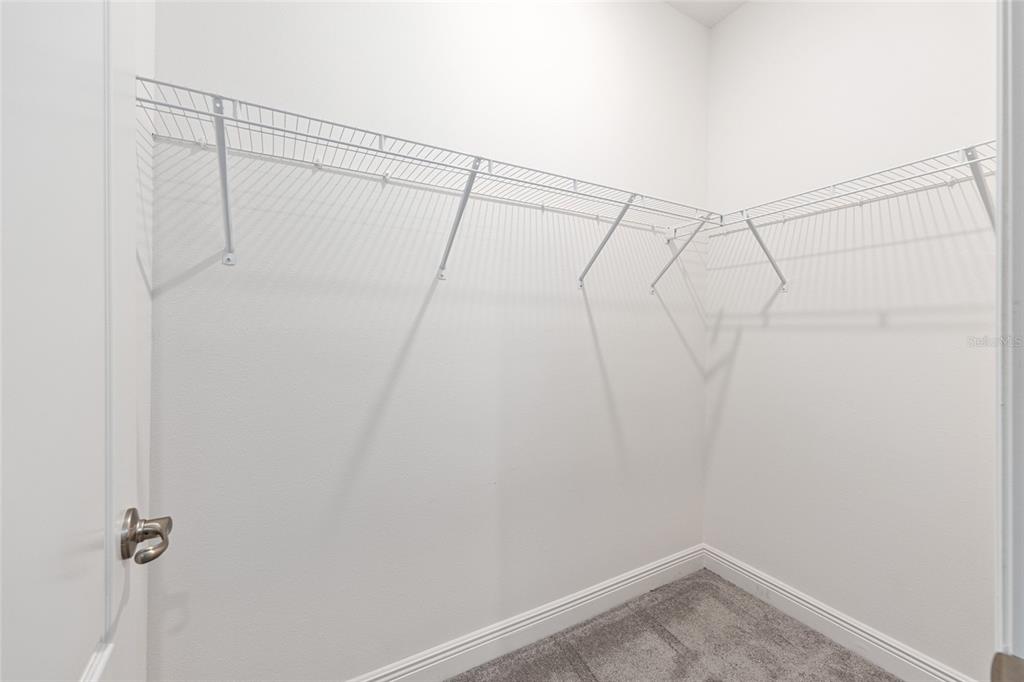 69 Grass Street Homosassa, FL 34446 - Photo 43 of 72 a view of a room with racks on the wall