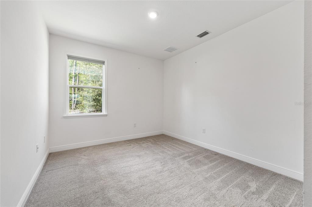 69 Grass Street Homosassa, FL 34446 - Photo 44 of 72 an empty room with a window
