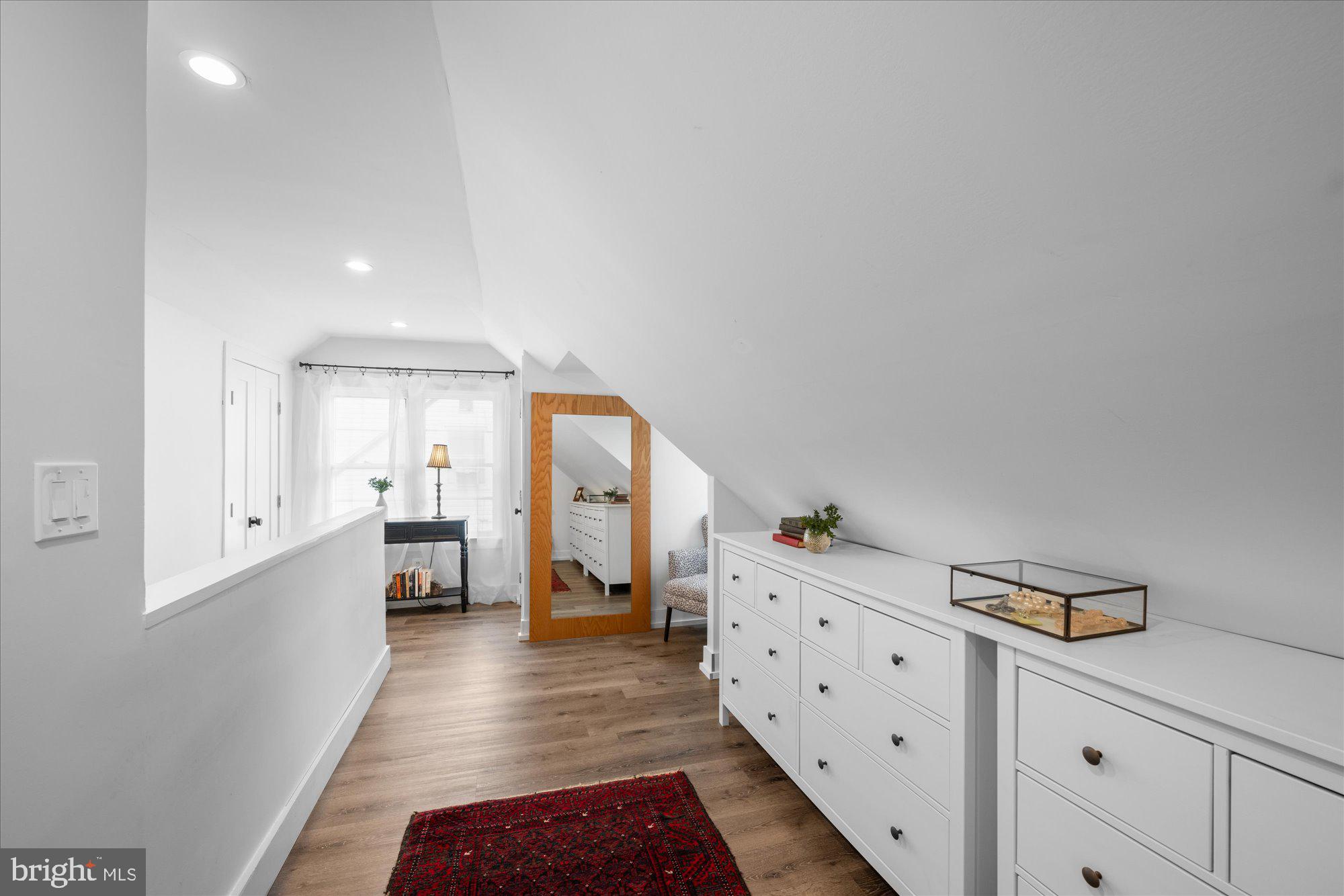 3010 Fayette Road Kensington, MD 20895 - Photo 14 of 54 a large white room with mirror and a wooden floor