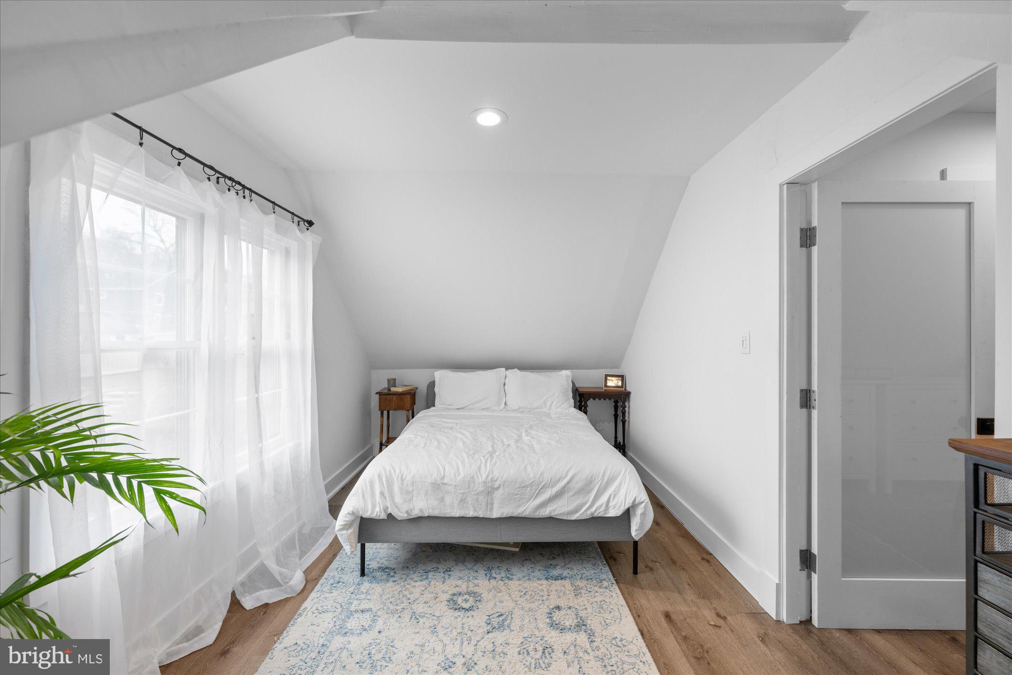 3010 Fayette Road Kensington, MD 20895 - Photo 18 of 54 a bedroom with a bed and a potted plant