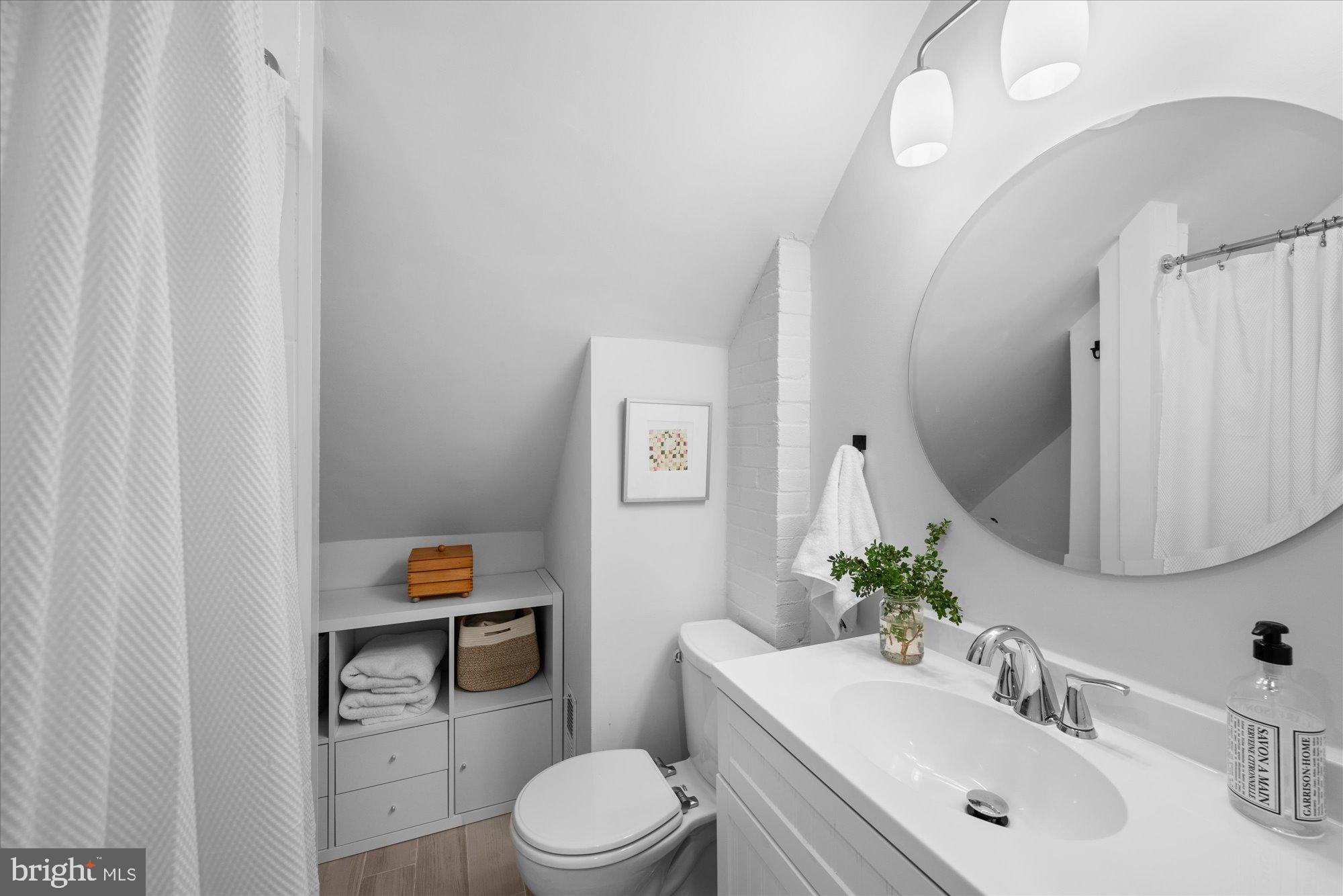 3010 Fayette Road Kensington, MD 20895 - Photo 19 of 54 a bathroom with a toilet sink and mirror