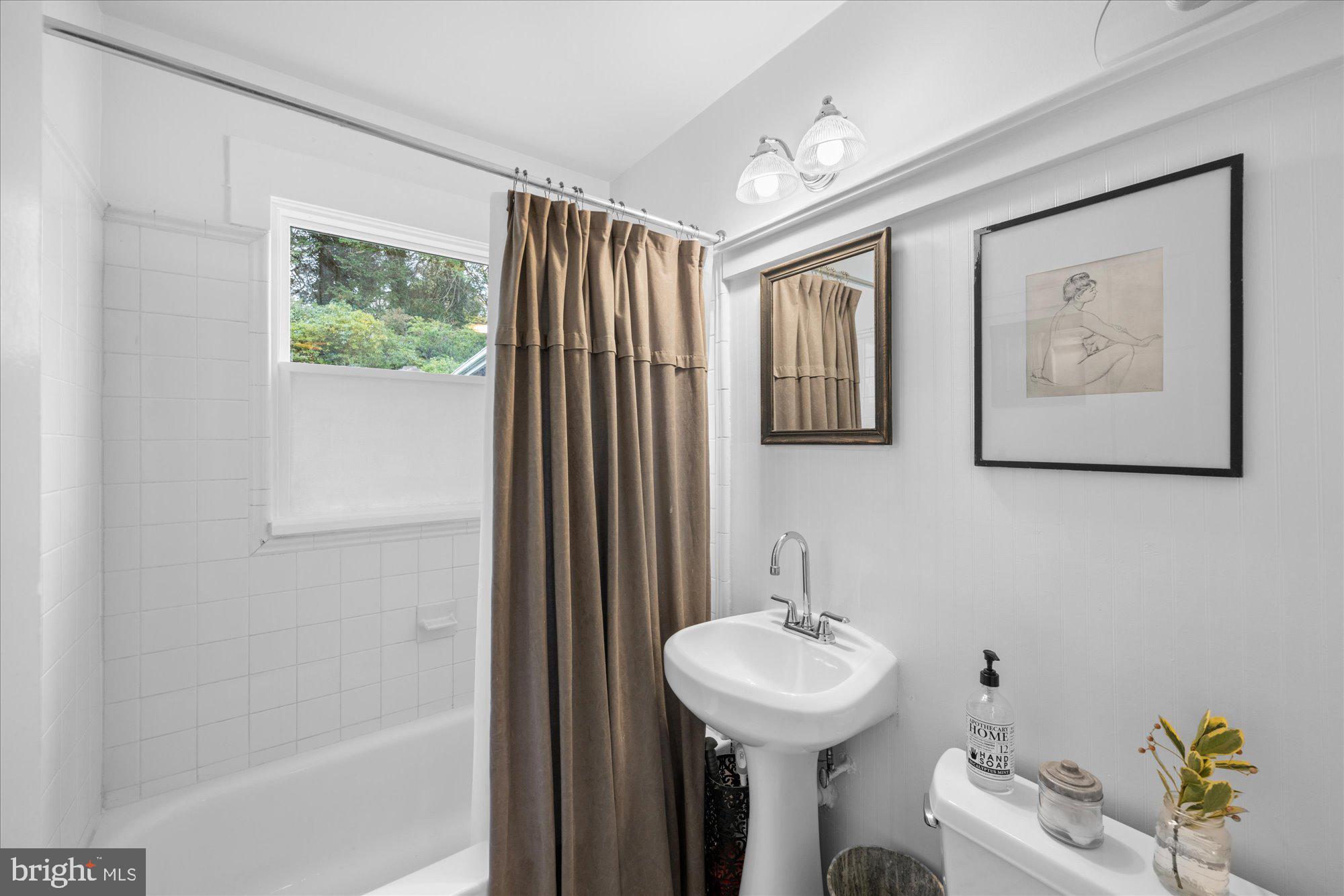 3010 Fayette Road Kensington, MD 20895 - Photo 23 of 54 a bathroom with a sink and a mirror