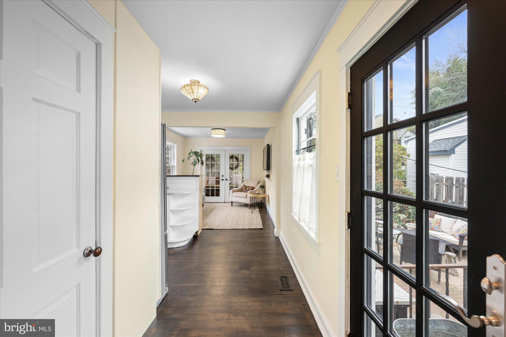 3010 Fayette Road Kensington, MD 20895 - Photo 7 of 54 a view of a hallway with wooden floor and windows