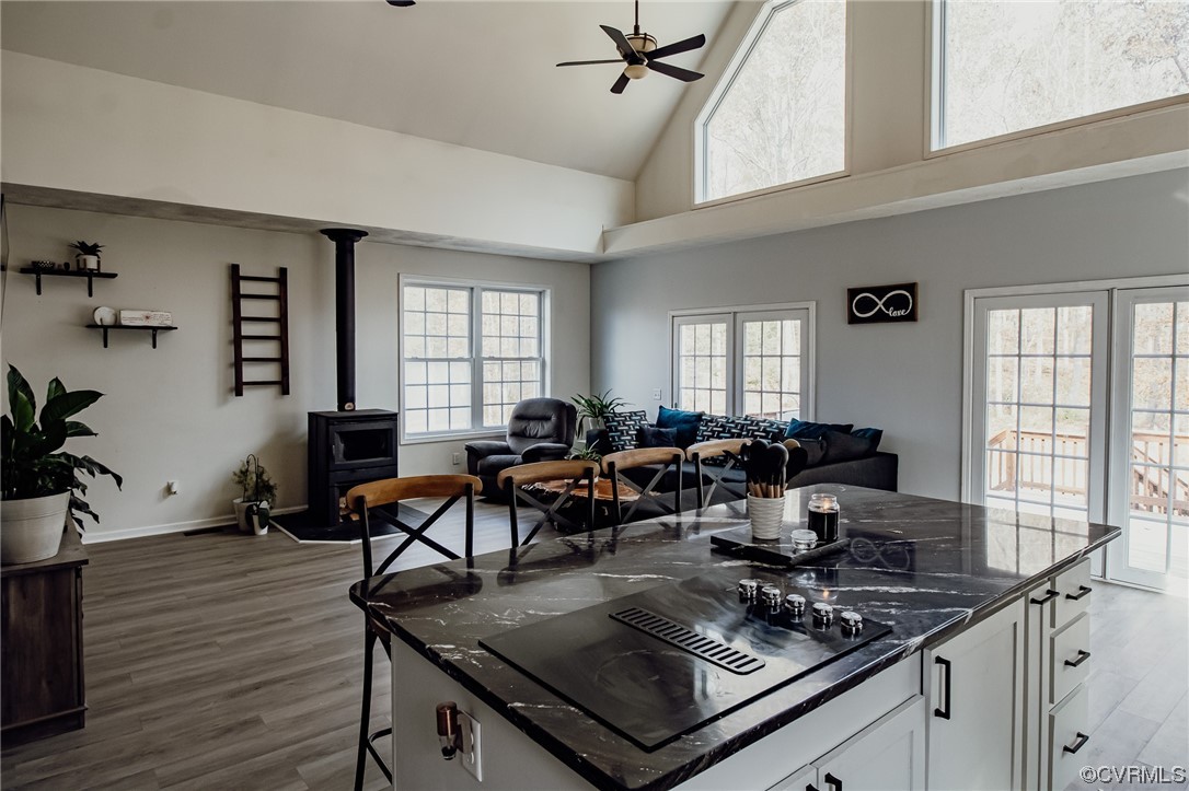 3105 Blue Bell Farms Road Powhatan, VA 23139 - Photo 13 of 50 a living room with furniture a wooden floor and next to a window