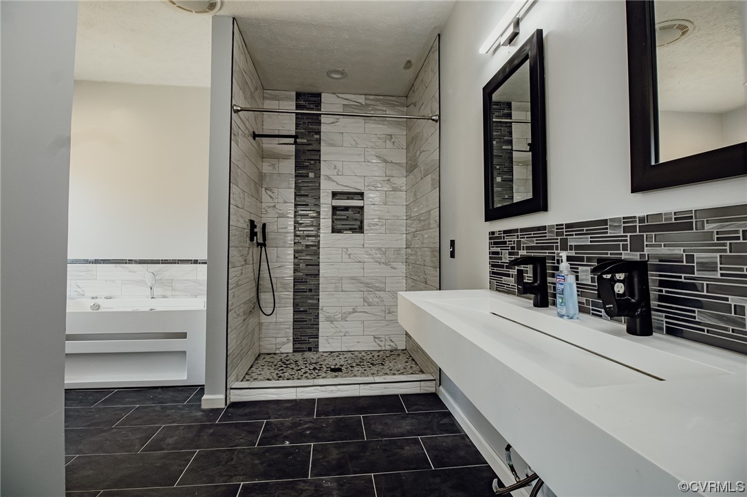 3105 Blue Bell Farms Road Powhatan, VA 23139 - Photo 22 of 50 a bathroom with a bathtub and a shower
