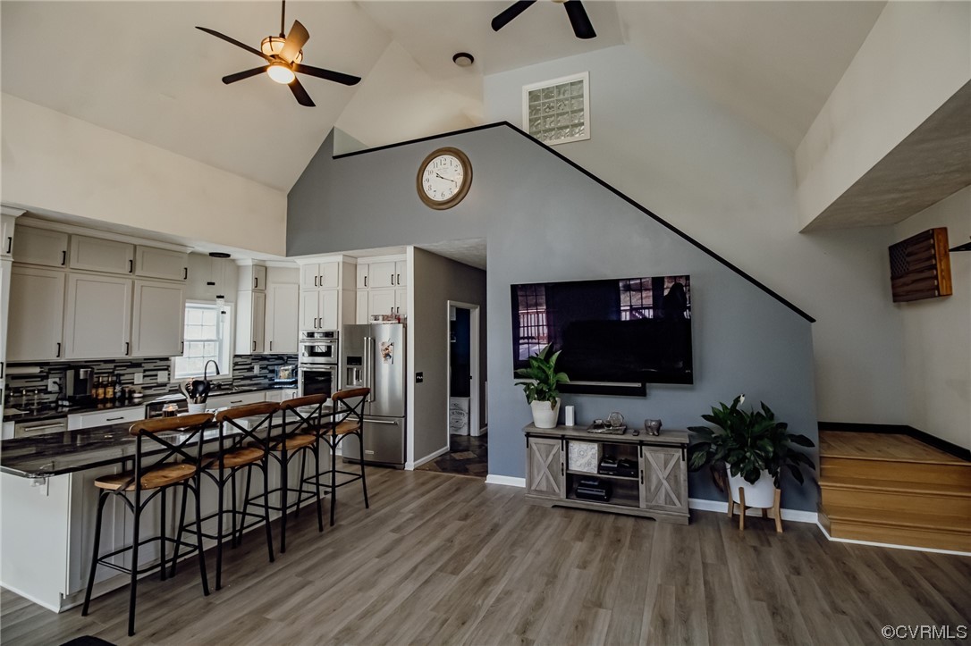 3105 Blue Bell Farms Road Powhatan, VA 23139 - Photo 29 of 50 a view of a livingroom with furniture and a flat screen tv