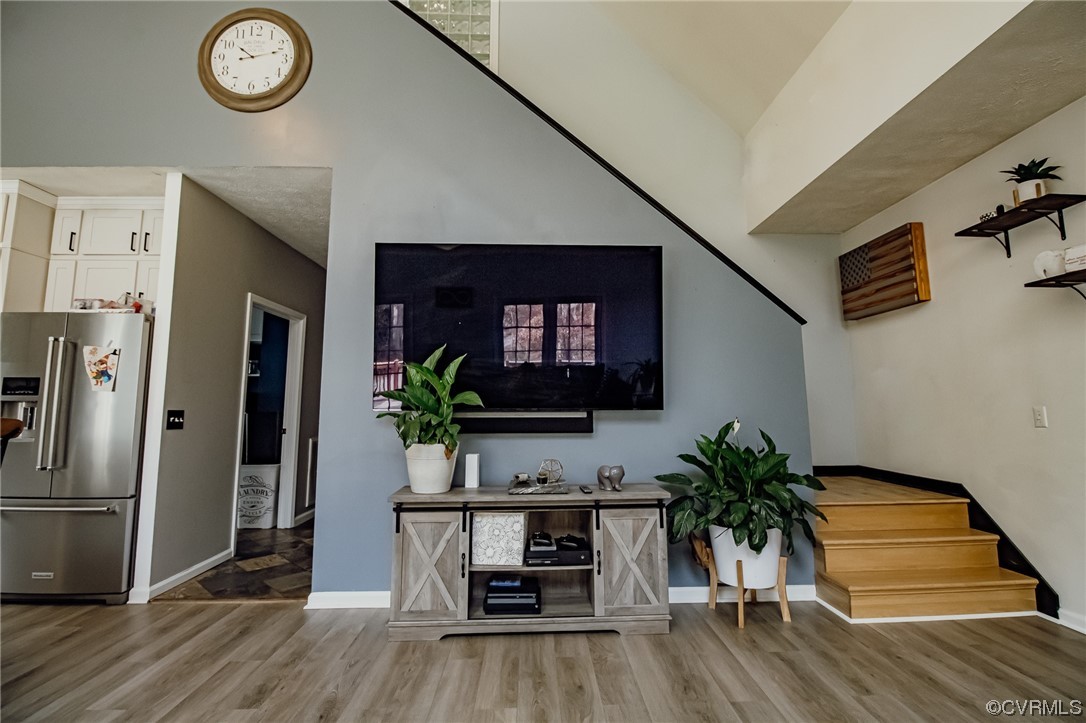 3105 Blue Bell Farms Road Powhatan, VA 23139 - Photo 30 of 50 a living room with furniture and a flat screen tv