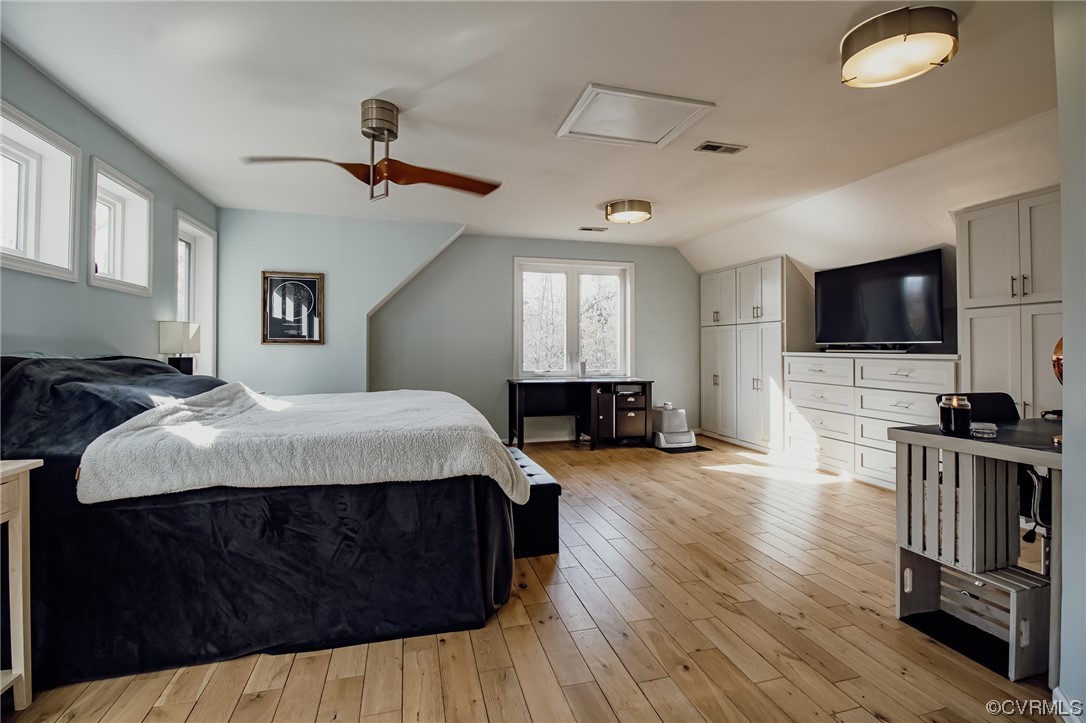 3105 Blue Bell Farms Road Powhatan, VA 23139 - Photo 32 of 50 a spacious bedroom with a bed and a flat screen tv