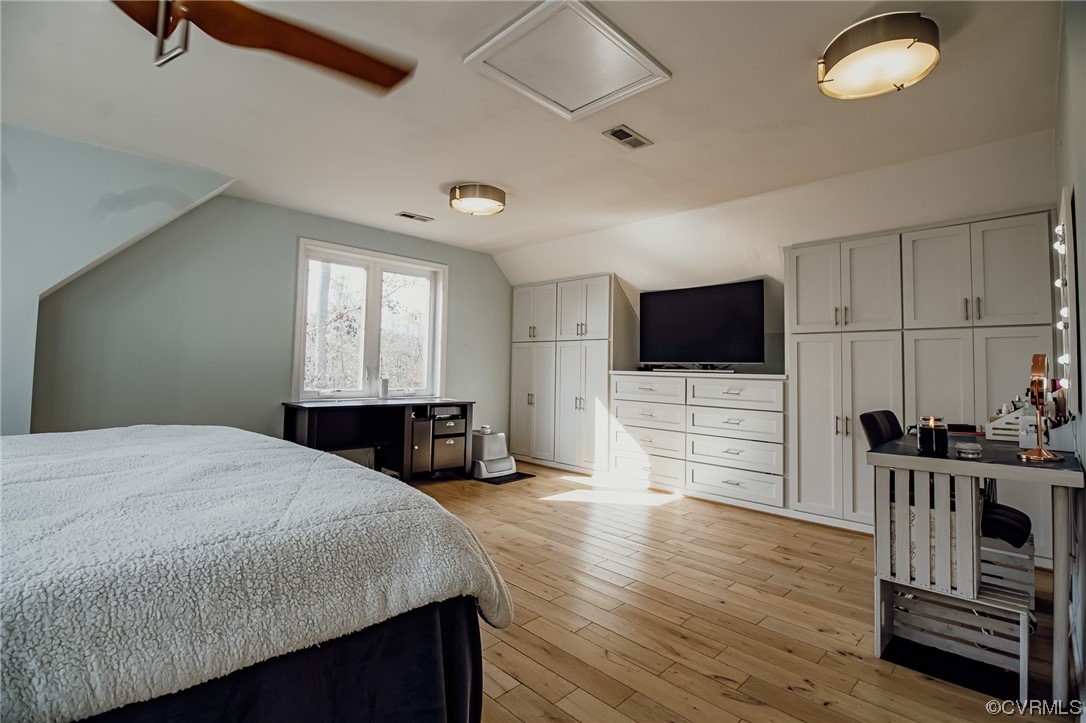 3105 Blue Bell Farms Road Powhatan, VA 23139 - Photo 34 of 50 a bedroom with a bed and a flat screen tv